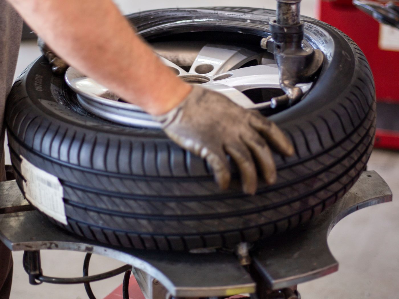 Tire being mounted onto an alloy wheel on a tire machine at a North Little Rock Arkansas wheel shop